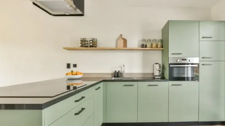 Green flat slab kitchen cabinets