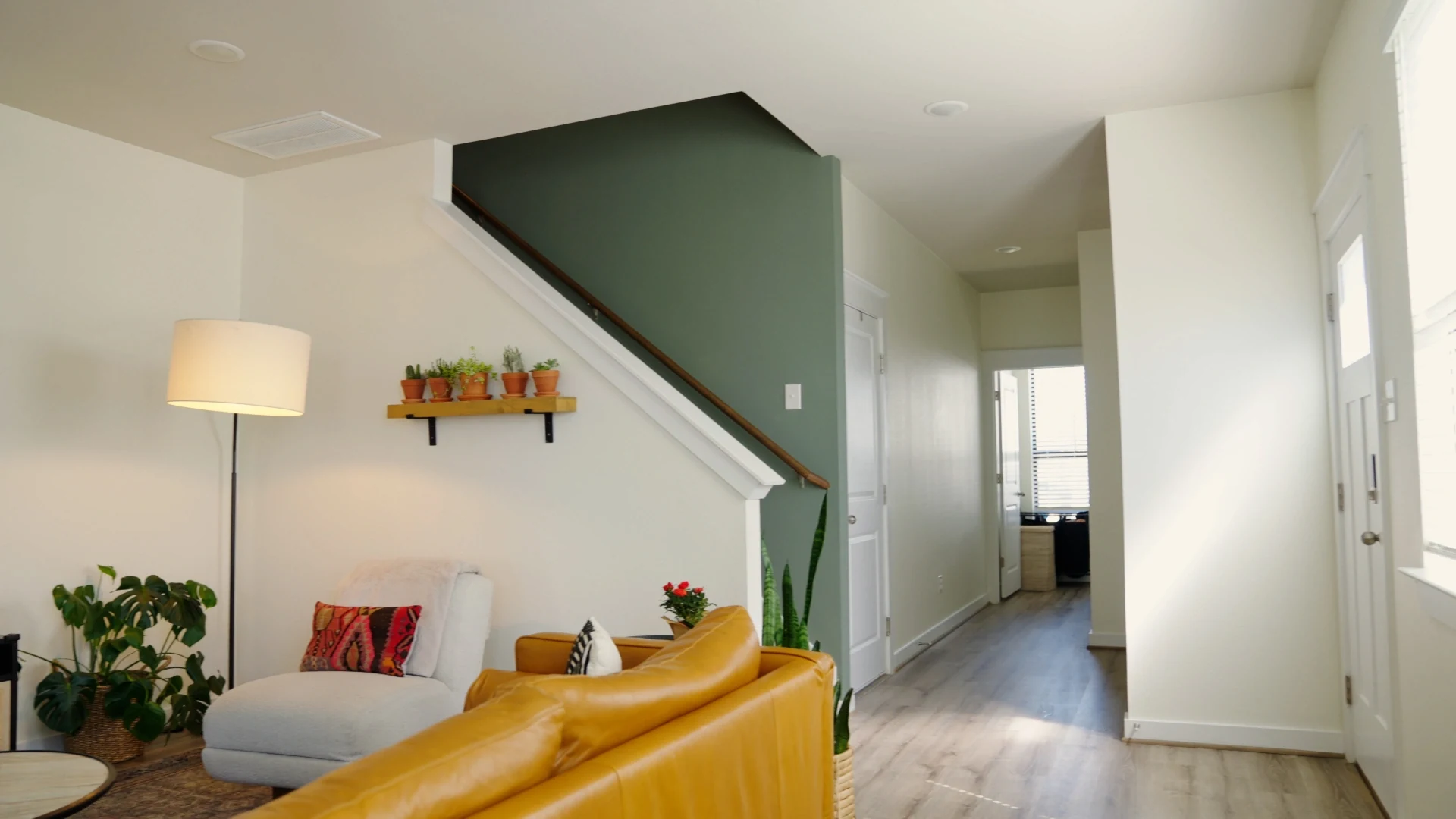 Fresh interior painting in a living room and hallway