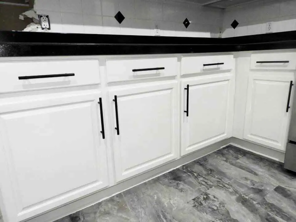 White cabinet doors with black hardware